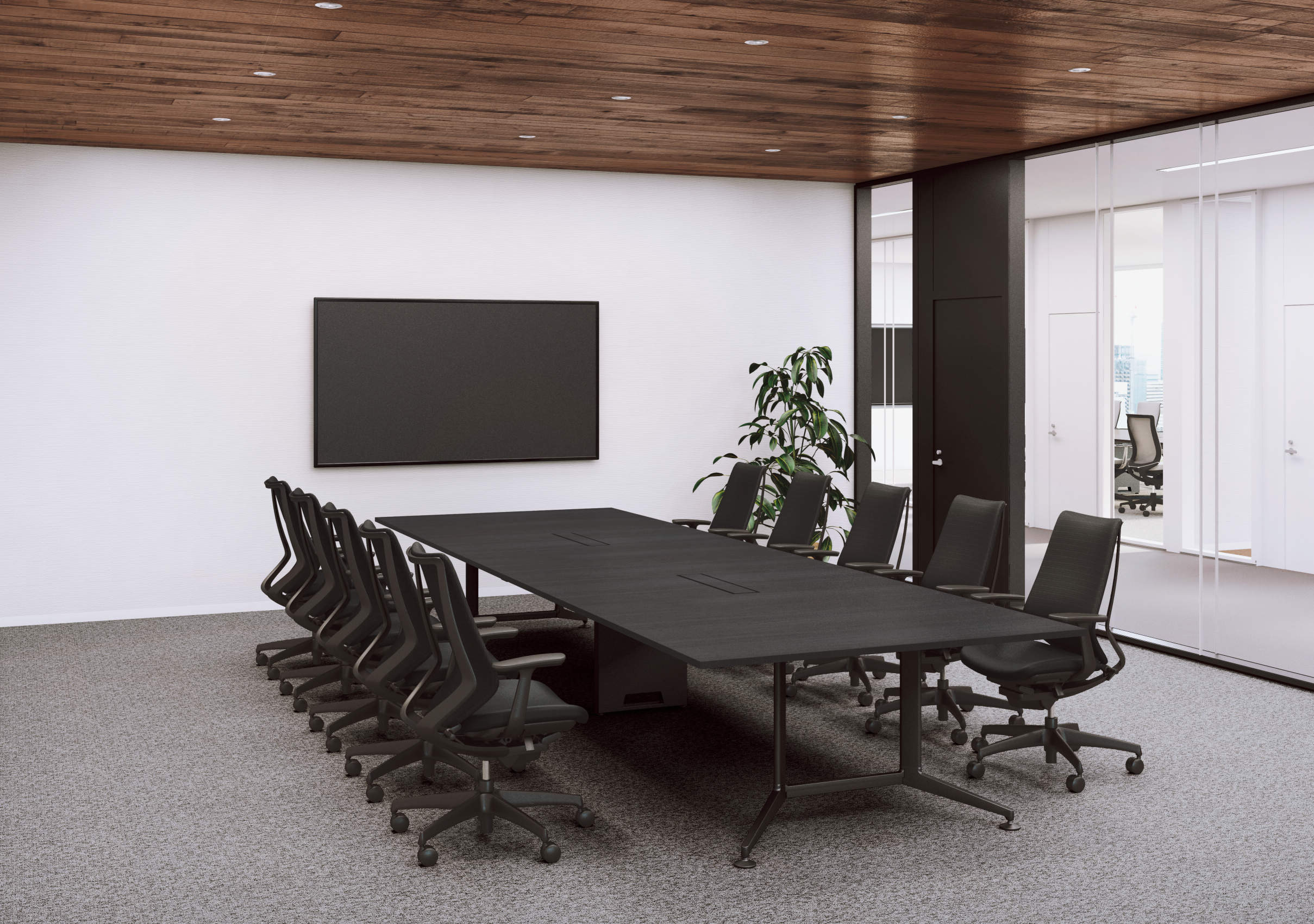 黒いテーブルと椅子で統一されたシックな10名用の会議室